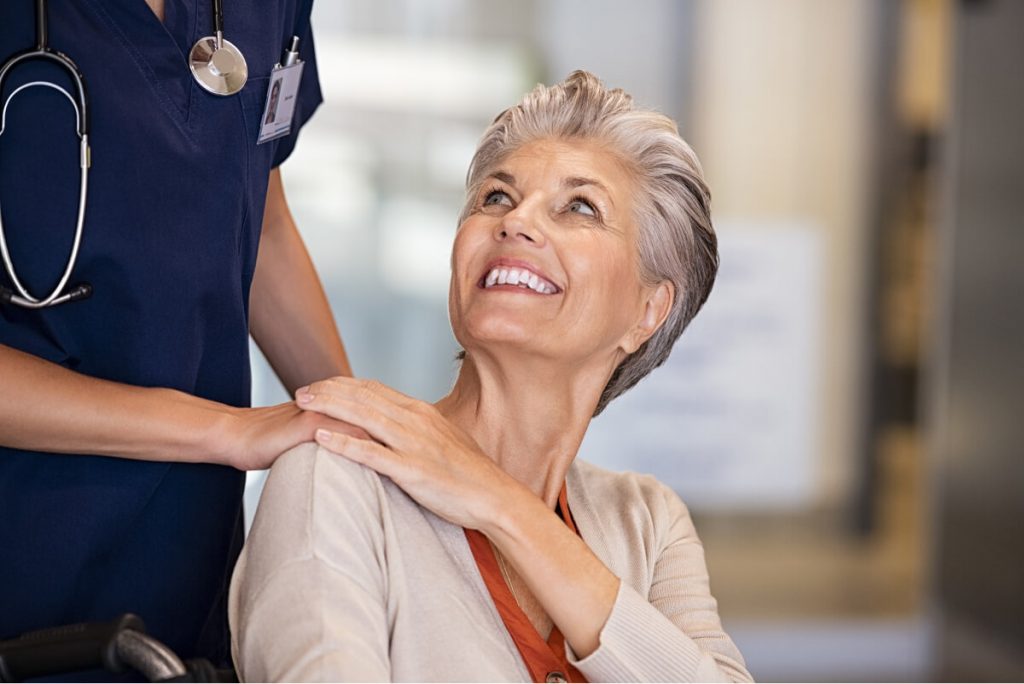caring nurse comforting old woman 2022 03 07 17 47 45 utc